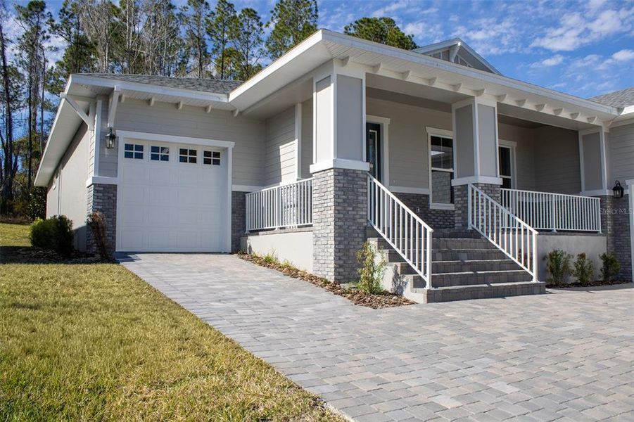Front exterior of a new home in Southern Hills Plantation, Brooksville, FL, highlighting curb appeal (Image 23).