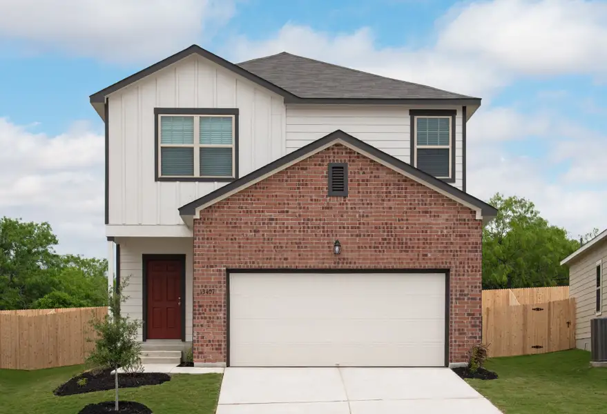 Front exterior of a new home in Williams Landing, Waller, TX, highlighting curb appeal (Image 1).