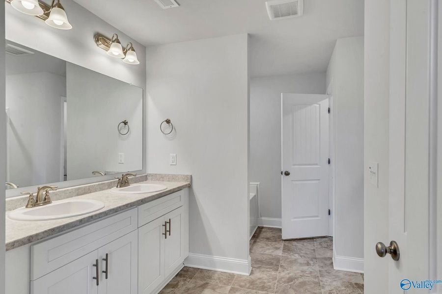 Representative furnished interior of a home built from the 2200 by Adams Homes in Winding Oaks, Weeki Wachee (Image 8). Representative furnished interior of a home built from the 2200 by Adams Homes in Winding Oaks, Weeki Wachee (Image 8).