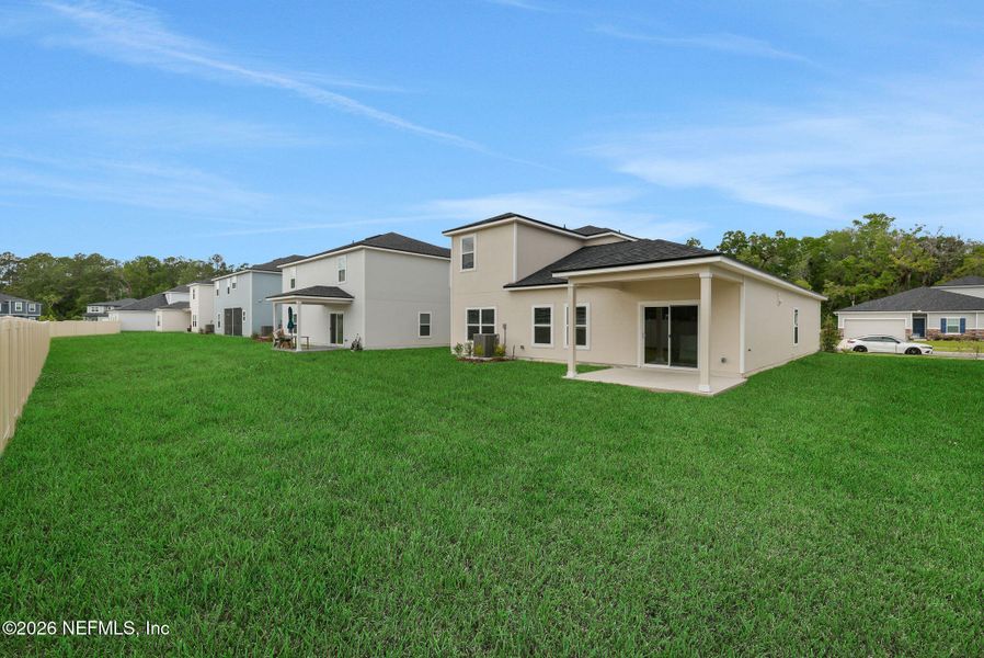 Exterior details and patio area of a home in Wilford Oaks, Orange Park (Image 29).
