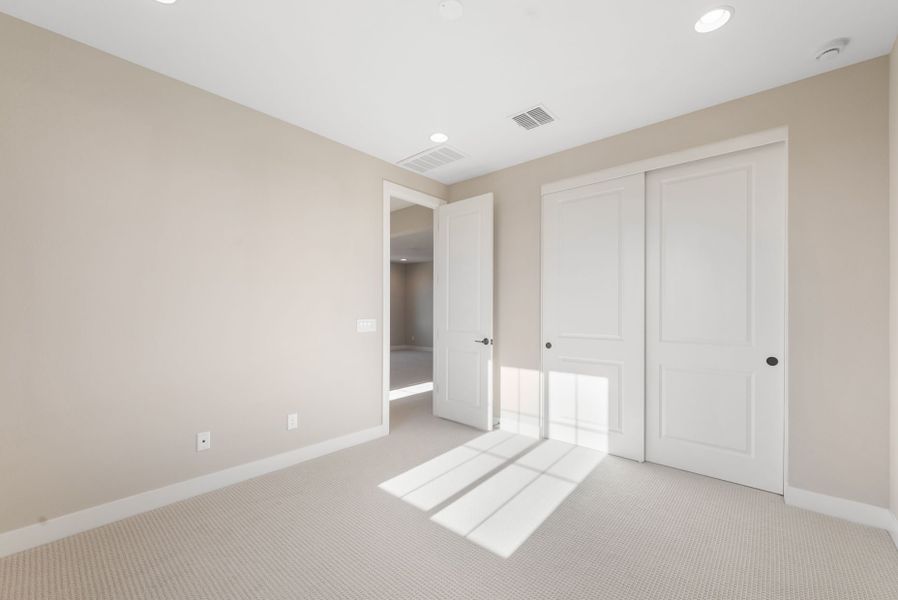 Spacious, unfurnished interior of a new home in Legado West, Queen Creek (Image 28).