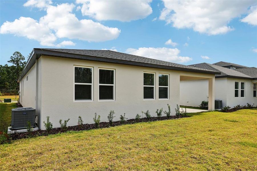 Exterior details and patio area of a home in Ridgehaven - Signature Series, Ormond Beach (Image 25).