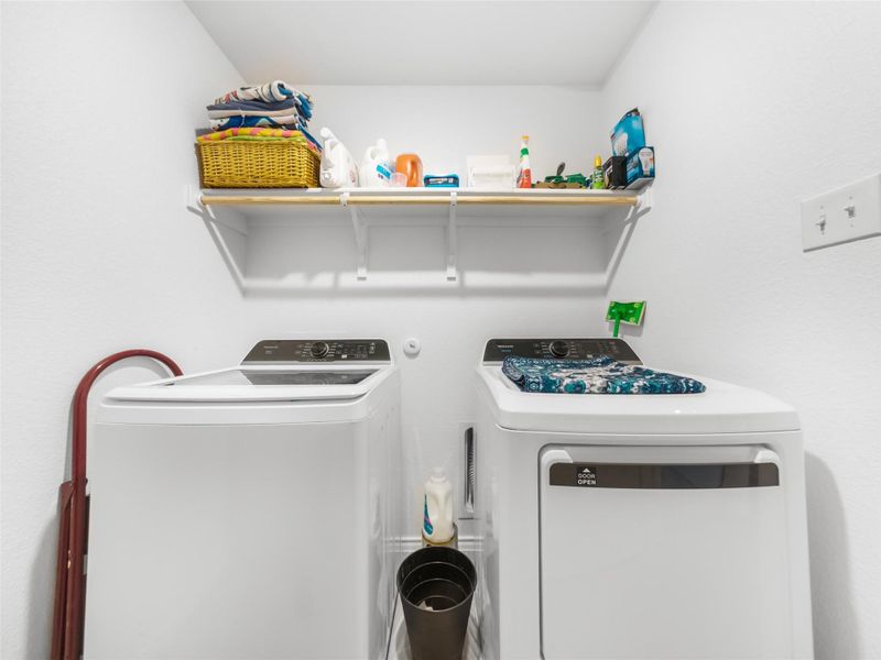 Laundry room with separate washer and dryer