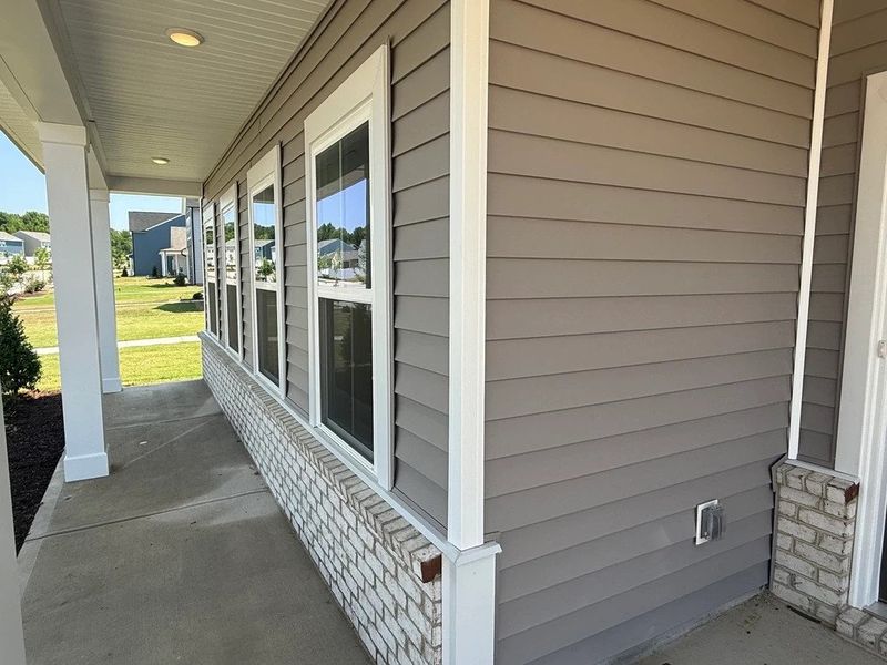Exterior details and patio area of a home in The Point, Rolesville (Image 4). Exterior details and patio area of a home in The Point, Rolesville (Image 4).
