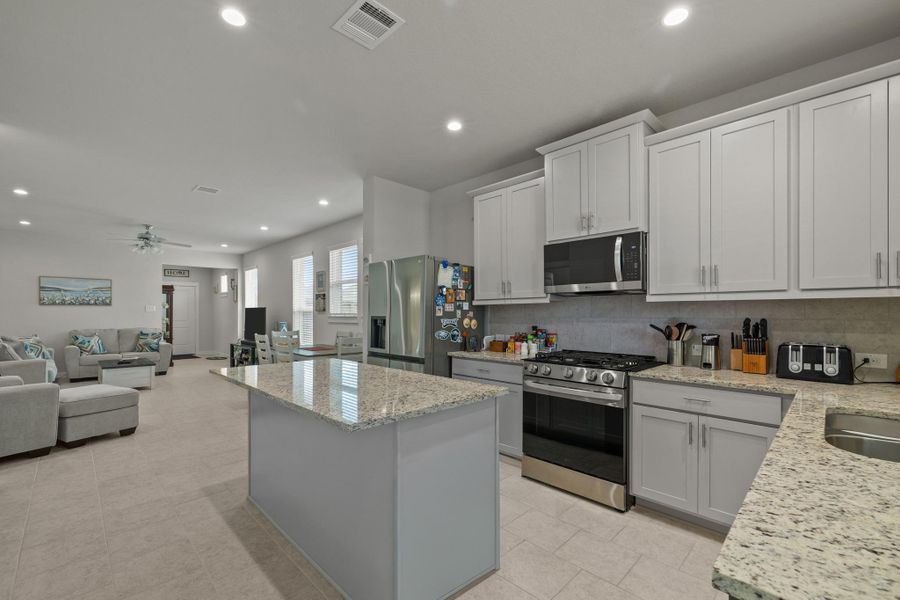 Furnished interior view inside a new home in , Iowa Colony (Image 9).