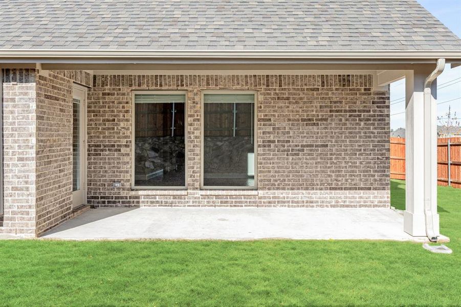 Exterior details and patio area of a home in Triple Diamond Ranch, Mansfield (Image 24).