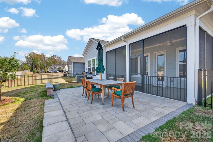 Rear Exterior with Paver Patio and Covered Screened in Porch Rear Exterior with Paver Patio and Covered Screened in Porch