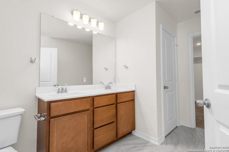 Furnished interior view inside a new home in Spanish Trails, San Antonio (Image 6).