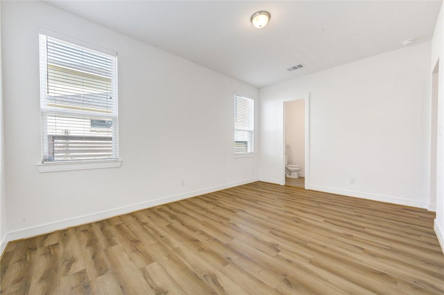 Spacious, unfurnished interior of a new home in Easthaven at Bridgeland Central, Cypress (Image 22).
