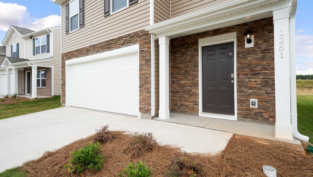 Exterior details and patio area of a home in Durbin Meadows, Fountain Inn (Image 2). Exterior details and patio area of a home in Durbin Meadows, Fountain Inn (Image 2).