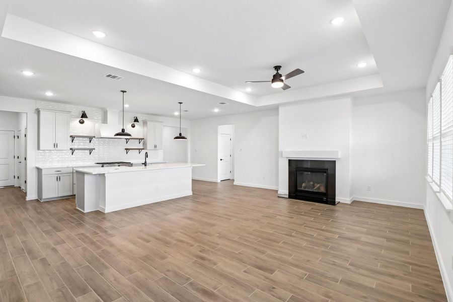 Open great room with cozy fireplace Open great room with cozy fireplace
