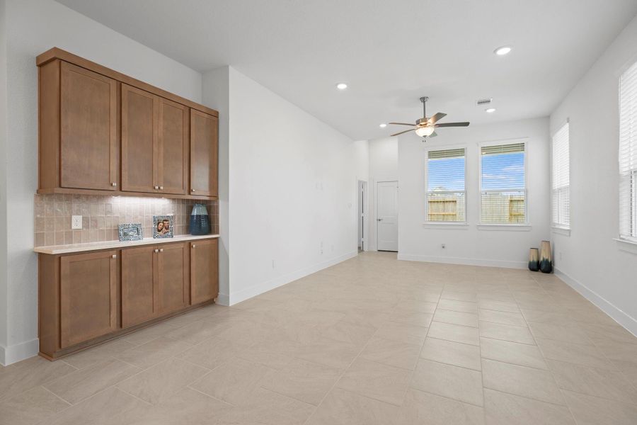 Furnished interior view inside a new home in Sunterra, Katy (Image 15).
