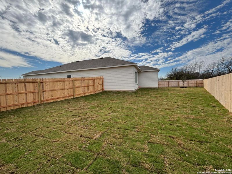 Exterior details and patio area of a home in The Summit at Saddlebrook Ranch 55's, Schertz (Image 25).