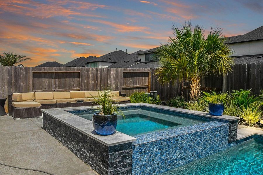 Large hot tub with beautiful blue crystal tiles. Large hot tub with beautiful blue crystal tiles.