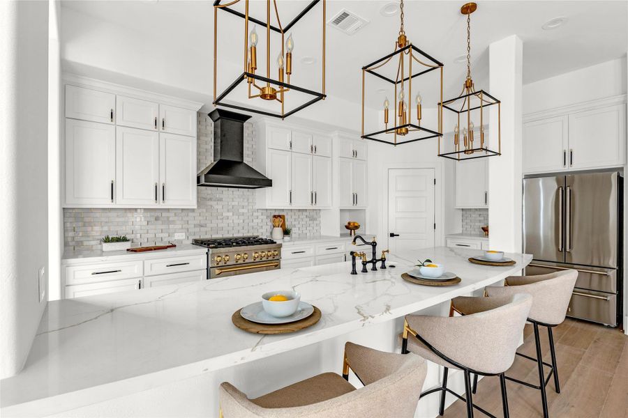 The kitchen impresses with quartz countertops, an expansive 11-foot island, and high-end designer touches.