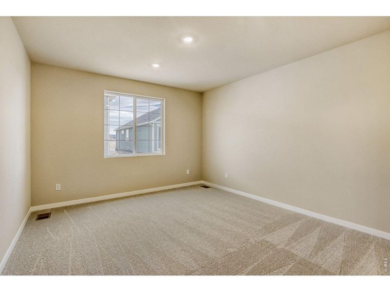 Spacious, unfurnished interior of a new home in Farmstead, Berthoud (Image 19).