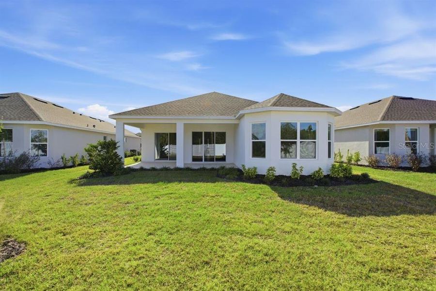 Exterior details and patio area of a home in Esplanade at Westview, Kissimmee (Image 4).