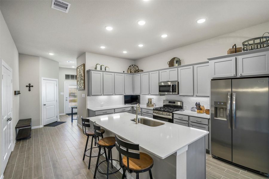 Furnished interior view inside a new home in The Highlands 40', Porter (Image 5).