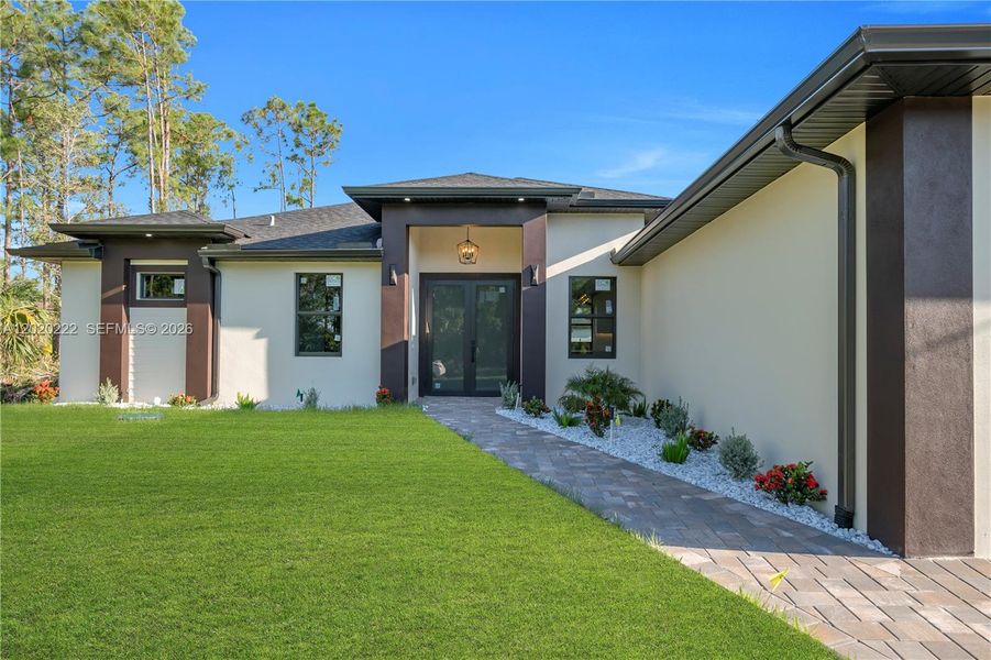 Exterior details and patio area of a home in , Lehigh Acres (Image 30).