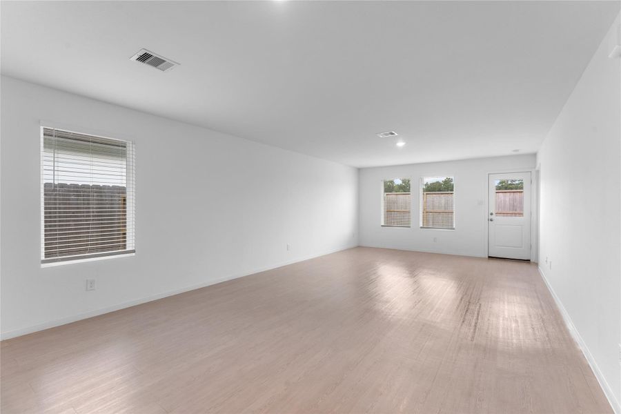 Additional view highlighting the room’s generous size and open layout.