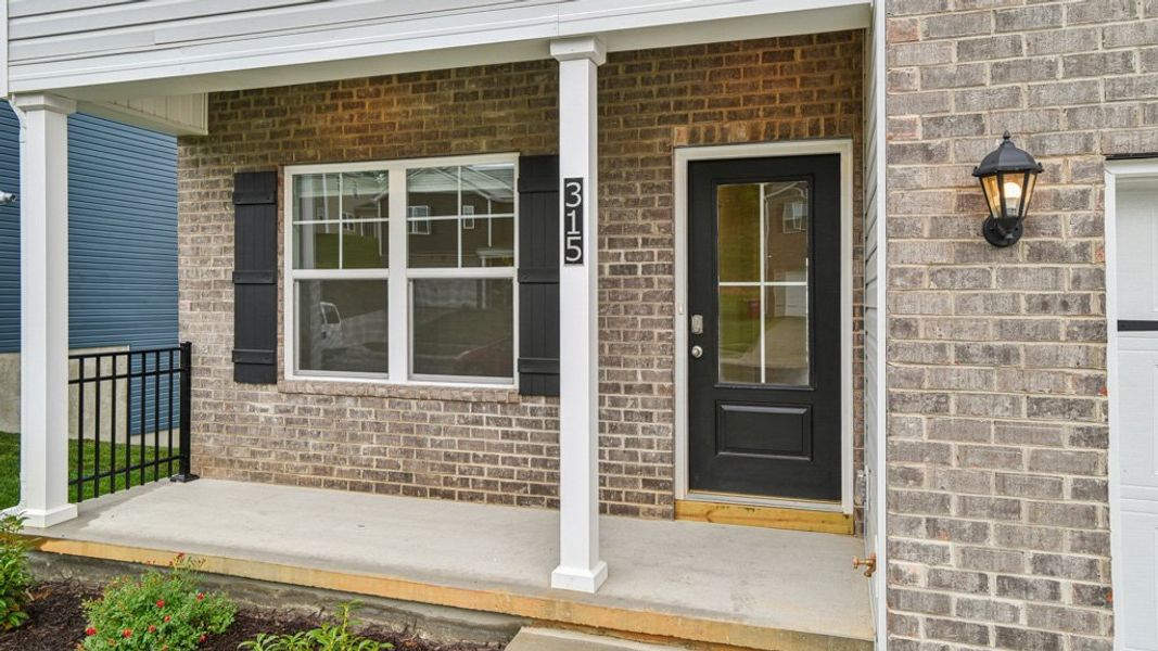 Front exterior of a new home in Archer's Pointe, Johnson City, TN, highlighting curb appeal (Image 22).