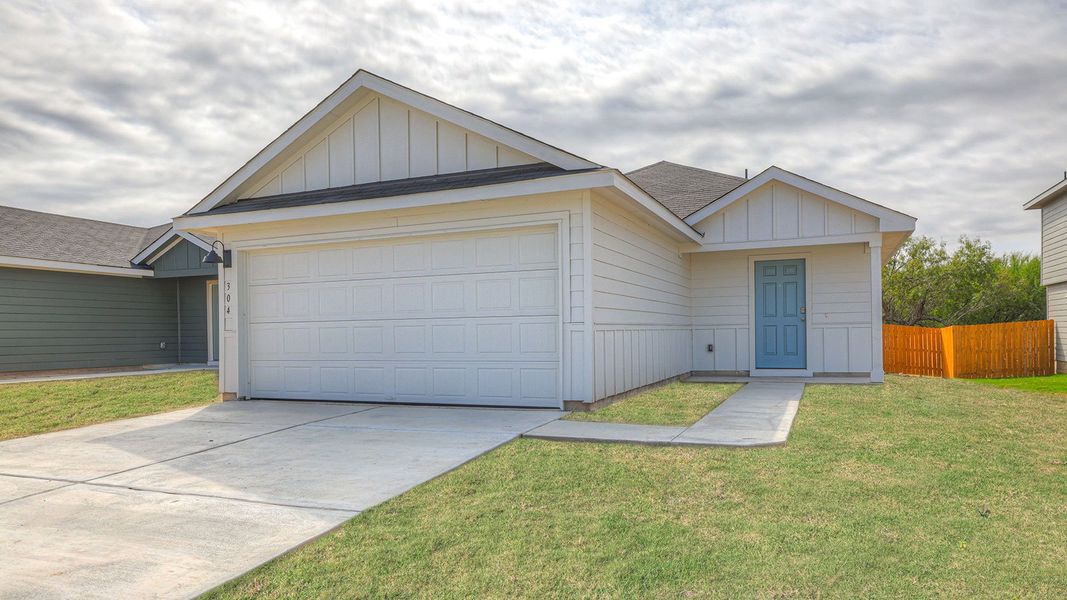 Front exterior of a new home in Ladera, Luling, TX, highlighting curb appeal (Image 22).