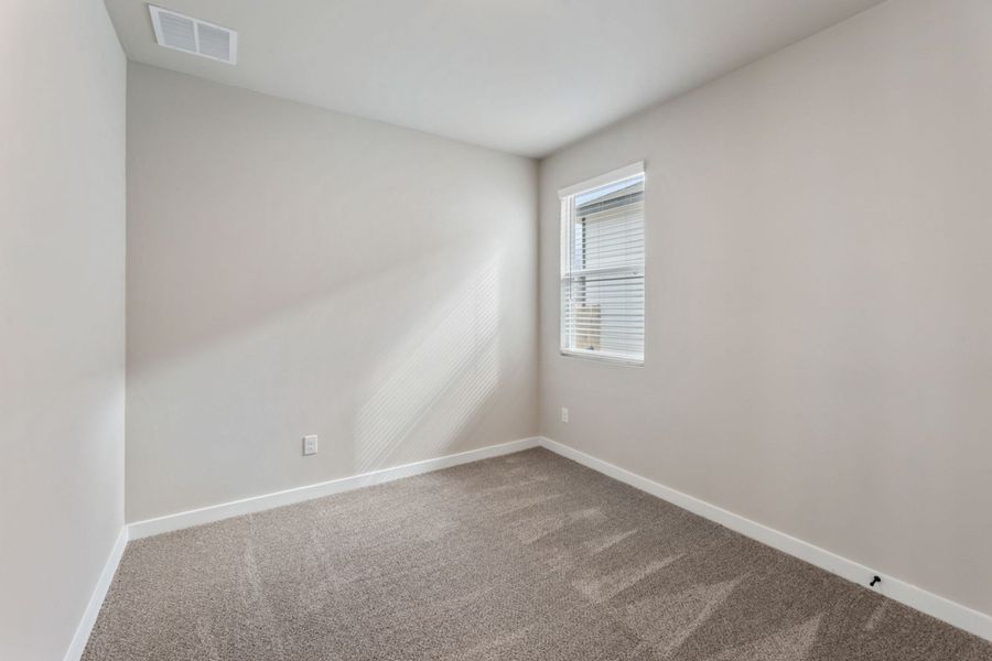 Representative unfurnished interior of a home built from the Pecos by Hakes Brothers in Highland Ridge, New Braunfels (Image 39).