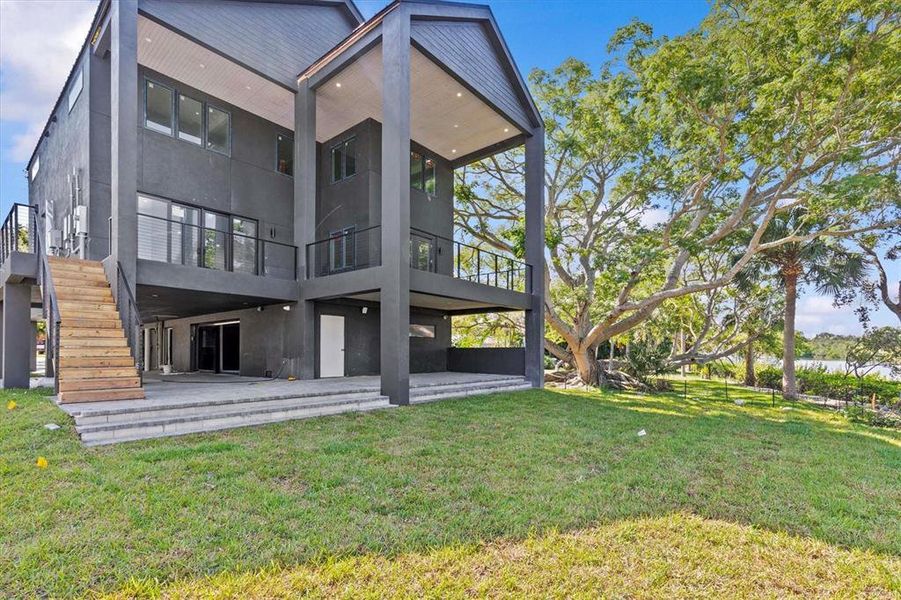 Front exterior of a new home in , Clearwater, FL, highlighting curb appeal (Image 23).