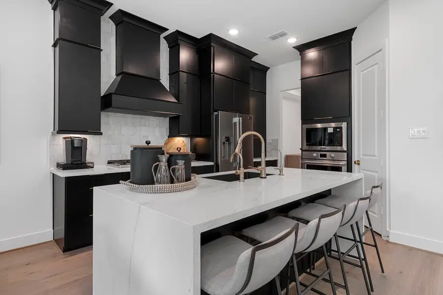 Furnished interior view inside a new home in The Highlands 50', Porter (Image 15).