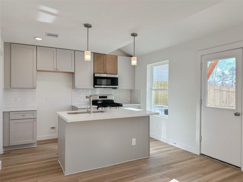 Furnished interior view inside a new home in , Conroe (Image 9).