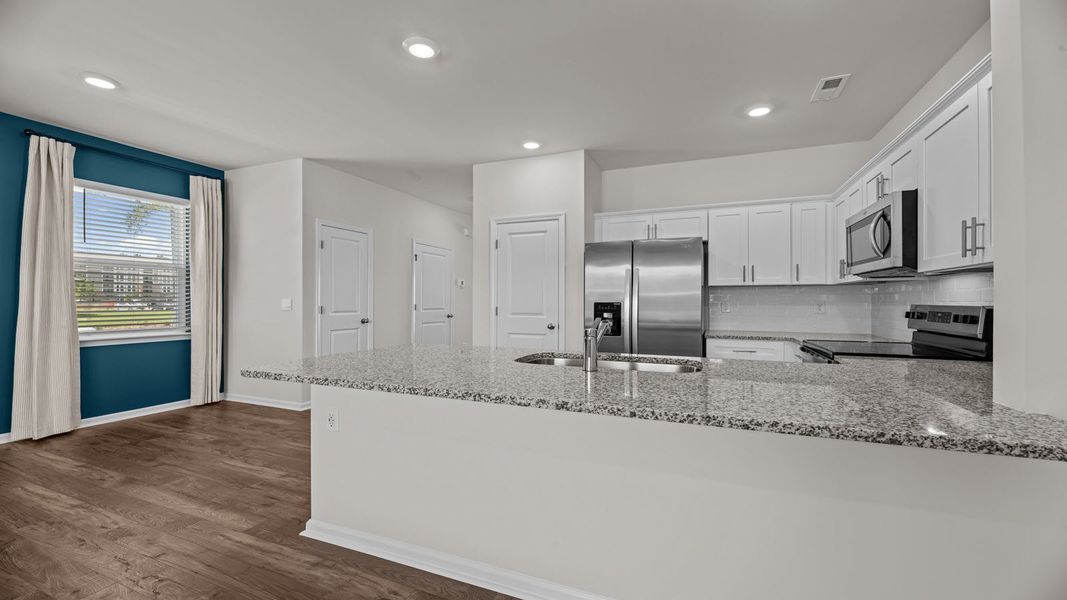 Representative furnished interior of a home built from the PEARSON II by D.R. Horton in Clock Road Townhomes, New Bern (Image 8). Representative furnished interior of a home built from the PEARSON II by D.R. Horton in Clock Road Townhomes, New Bern (Image 8).