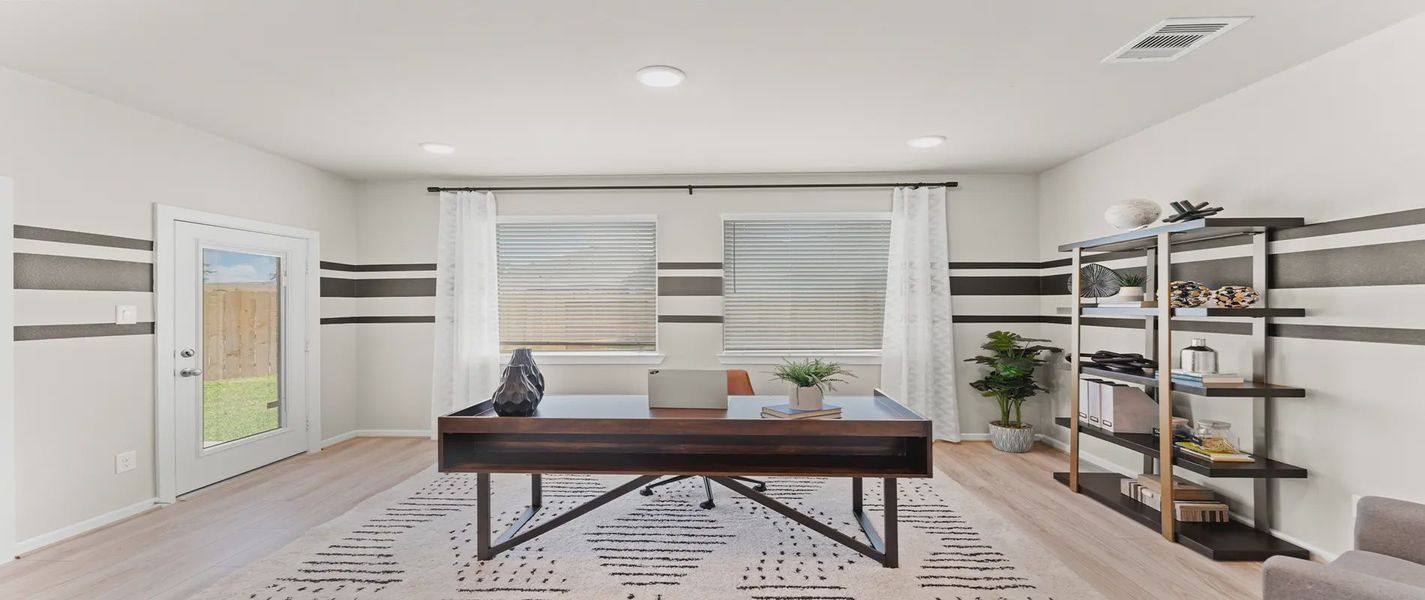 Representative furnished interior of a home built from the Hawkins by Chesmar Homes in Sienna Courtyard, Missouri City (Image 4).