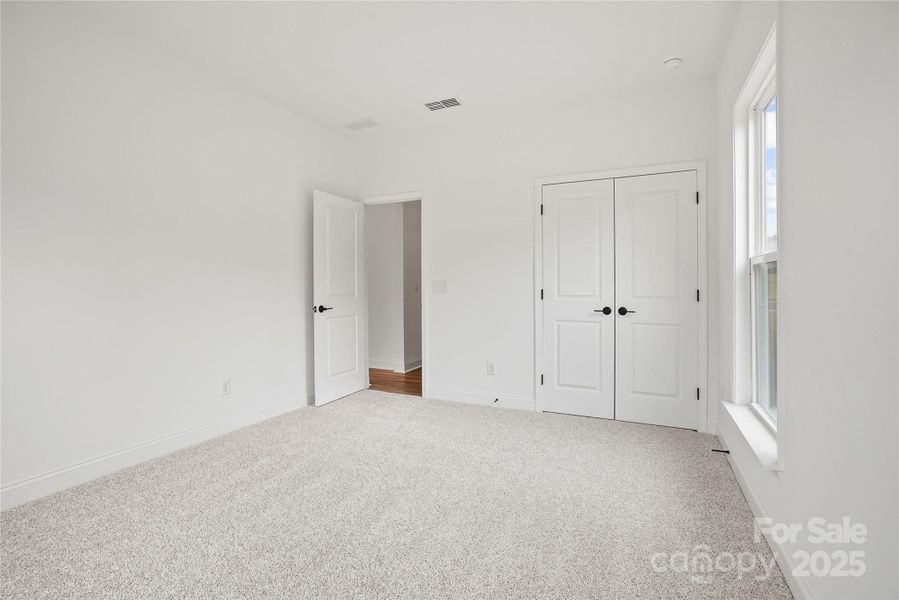 Spacious, unfurnished interior of a new home in Forest Creek, Waxhaw (Image 28).