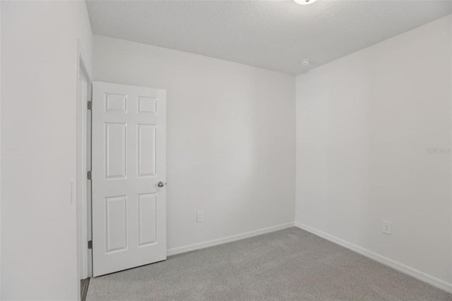 Spacious, unfurnished interior of a new home in Springs at Lake Alfred - Classic Series, Lake Alfred (Image 45).