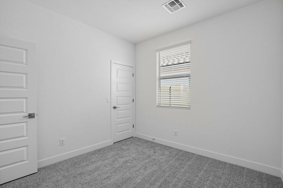 Spacious, unfurnished interior of a new home in Rancho Mercado, Surprise (Image 18).