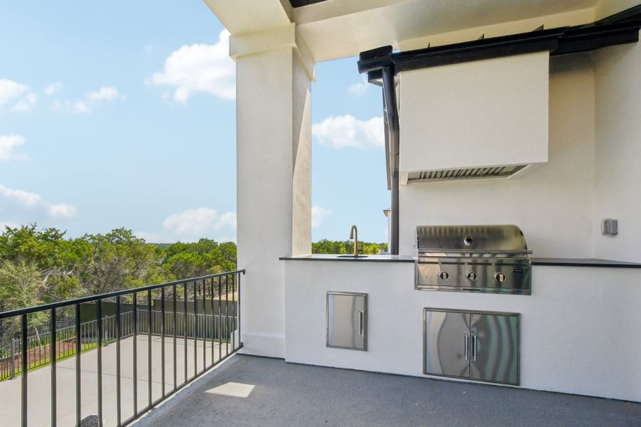 Exterior details and patio area of a home in Milky Way at River Place, Austin (Image 2). Exterior details and patio area of a home in Milky Way at River Place, Austin (Image 2).