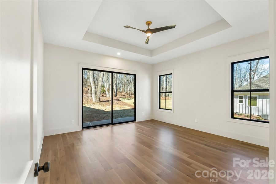 Spacious primary and pet friendly - letting our four legged friends right outside :)