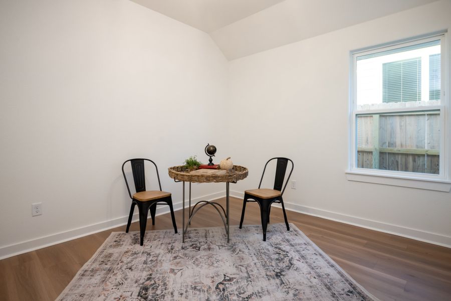 Representative furnished interior of a home built from the The Rose by Avonley Homes in Pinemont, Bryan (Image 20).