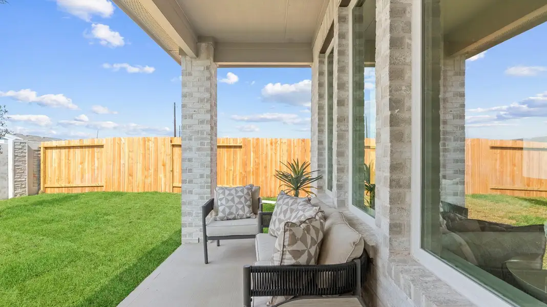Exterior details and patio area of a home in Westland Ranch 50' Homesites, League City (Image 2).