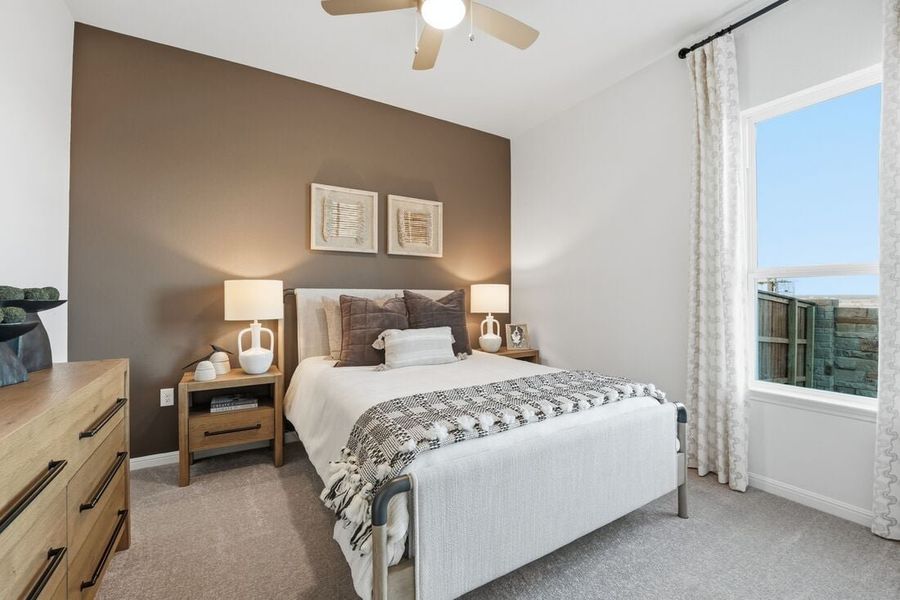 Representative furnished interior of a home built from the Burnet by Taylor Morrison in Village Grove, Dripping Springs (Image 13).