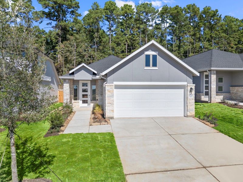 Front exterior of a new home in Westridge Cove, Conroe, TX, highlighting curb appeal (Image 19).
