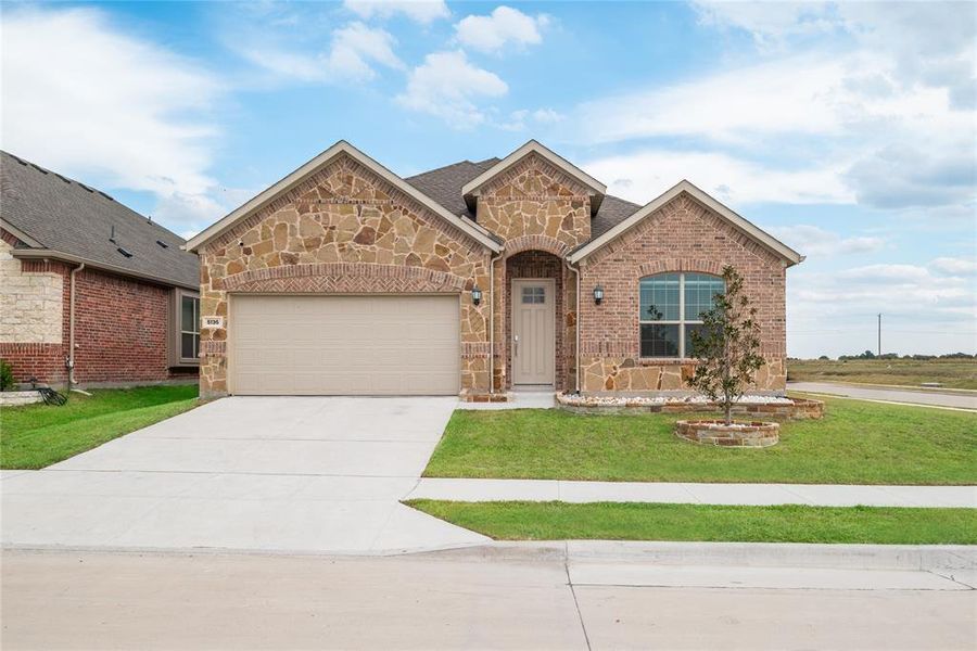 Front exterior of a new home in Bridgewater: Brookstone Collection, Princeton, TX, highlighting curb appeal (Image 1). Front exterior of a new home in Bridgewater: Brookstone Collection, Princeton, TX, highlighting curb appeal (Image 1).