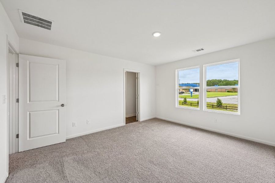 A room with white walls and a window. A room with white walls and a window.