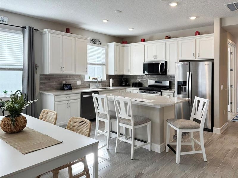 Furnished interior view inside a new home in Del Webb Oasis, Winter Garden (Image 9).