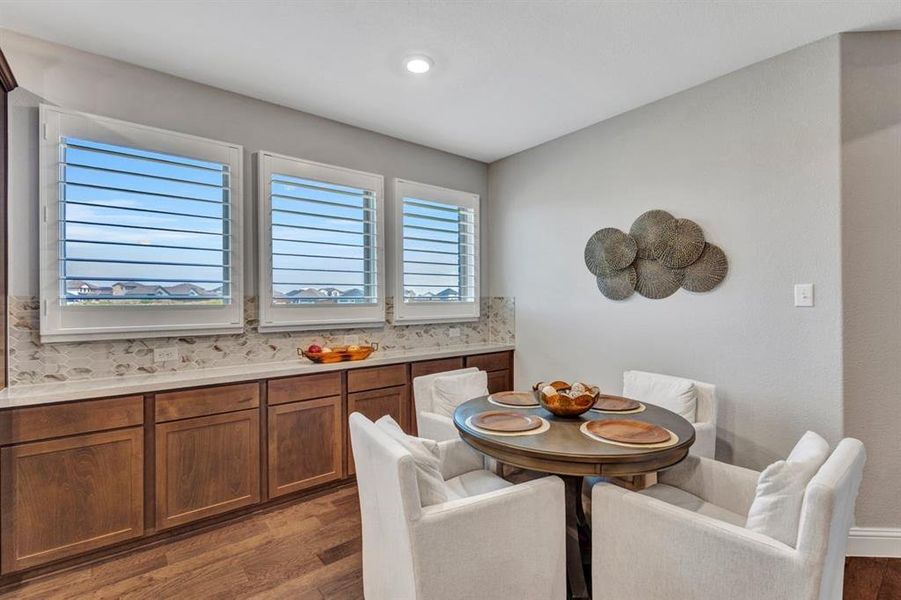 Dining area with amazing built in cabinets.