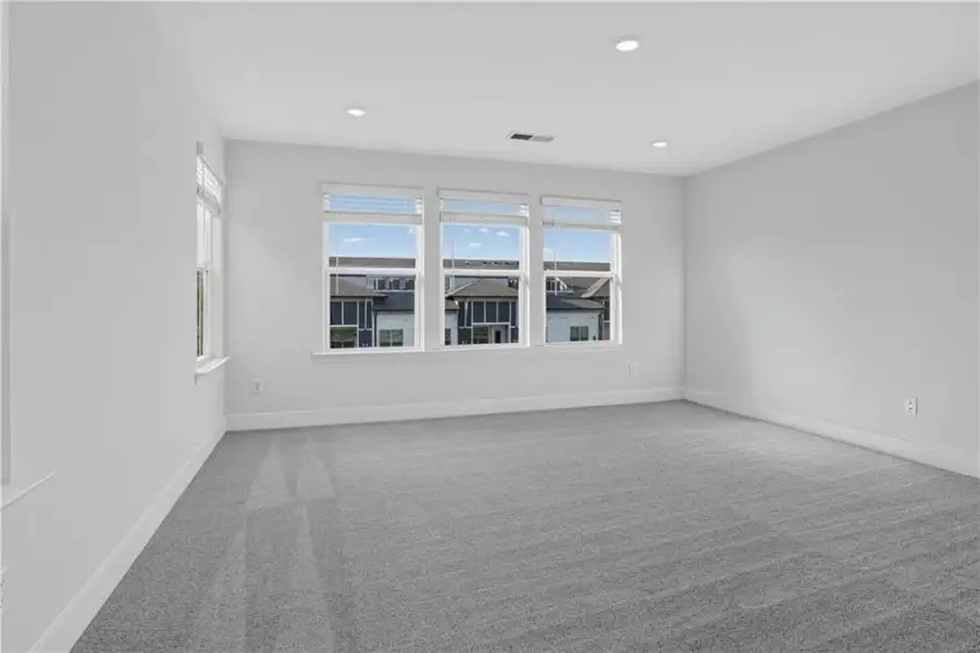 Spacious, unfurnished interior of a new home in Towns at Holly Springs, Holly Springs (Image 27).