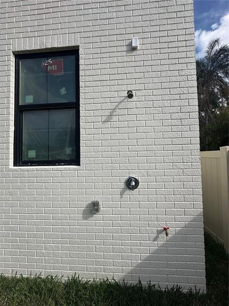 Exterior details and patio area of a home in , Tampa (Image 14).