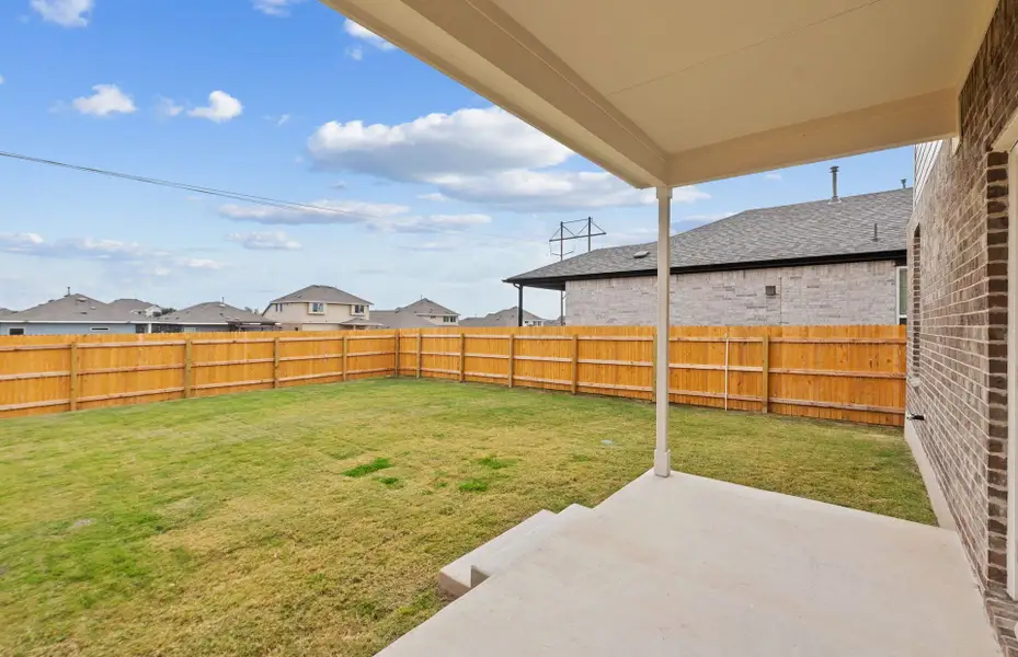 Exterior details and patio area of a home in Crosswinds, Kyle (Image 3).