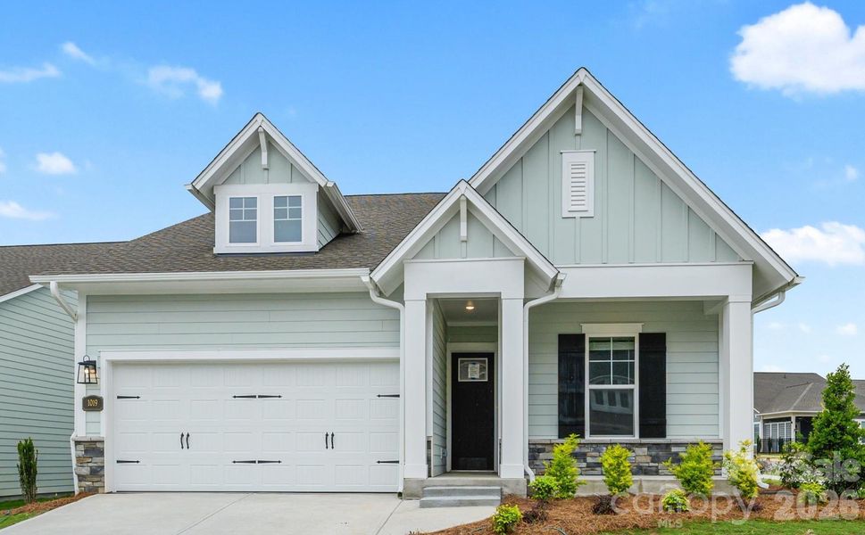 Front exterior of a new home in Encore at Streamside - Classic Series, Waxhaw, NC, highlighting curb appeal (Image 2). Front exterior of a new home in Encore at Streamside - Classic Series, Waxhaw, NC, highlighting curb appeal (Image 2).