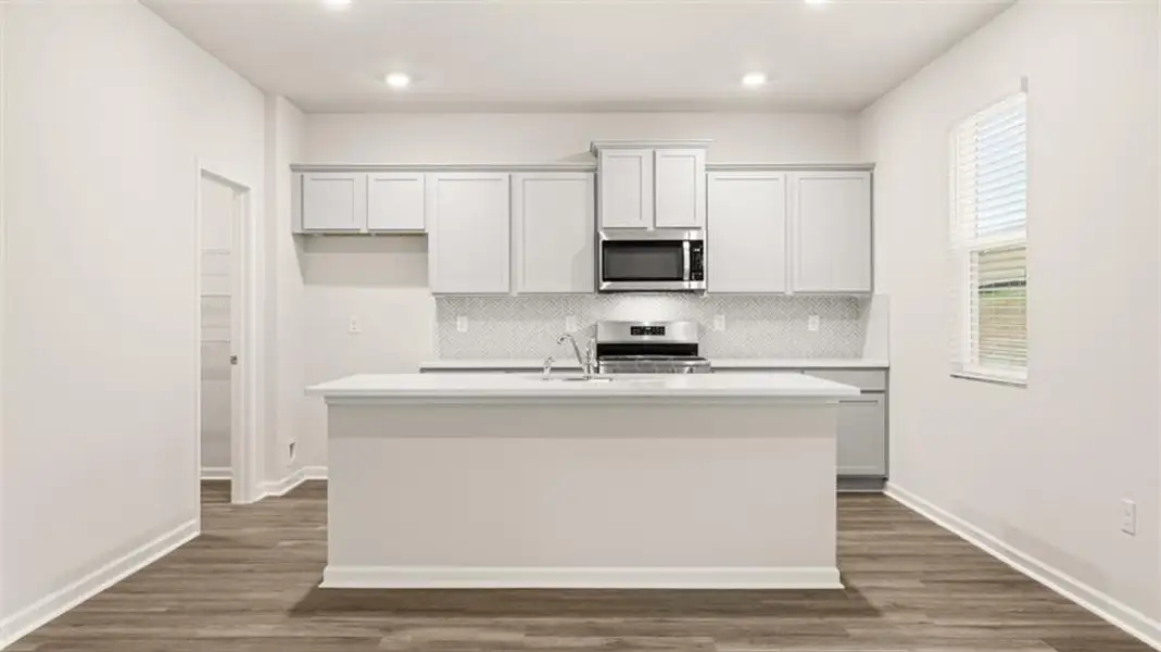 Furnished interior view inside a new home in Preserve at Dove Creek, Statham (Image 5).